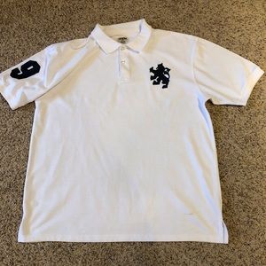 💥🔥💧White polo shirt with lion and number on sleeve 💧🔥💥